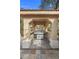 Outdoor kitchen featuring a stainless steel BBQ grill and stone flooring at 7450 Via Olivero Ave, Las Vegas, NV 89117