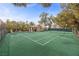 Private tennis court with a gazebo for relaxing and watching games at 7450 Via Olivero Ave, Las Vegas, NV 89117