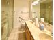 Bathroom with double vanity, walk in shower and tiled floors at 7874 Clearwood Ave, Las Vegas, NV 89123