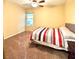 Bedroom with window, ceiling fan and carpet at 7874 Clearwood Ave, Las Vegas, NV 89123