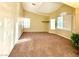 Bright living room with vaulted ceilings and neutral carpeting at 7874 Clearwood Ave, Las Vegas, NV 89123