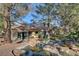 Charming backyard oasis with pond and waterfall features at 7923 Canoe Ln, Las Vegas, NV 89145