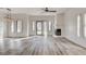 Bright living room featuring hardwood floors and a fireplace at 7923 Canoe Ln, Las Vegas, NV 89145