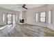 Bright living room with fireplace and sliding glass door at 7923 Canoe Ln, Las Vegas, NV 89145