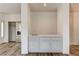 Simple wet bar with sink and gray cabinets at 7923 Canoe Ln, Las Vegas, NV 89145