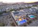 Modern home with a private pool and spacious backyard, aerial view at 8 Hilltop Crest St, Henderson, NV 89011