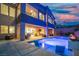 Stunning backyard featuring a pool, lounge area, and outdoor dining space, perfect for entertaining at 8 Hilltop Crest St, Henderson, NV 89011