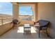 Private balcony with mountain views and seating at 8 Hilltop Crest St, Henderson, NV 89011