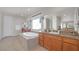 Elegant bathroom features a soaking tub, spacious countertop, and modern fixtures at 8 Hilltop Crest St, Henderson, NV 89011