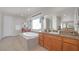 Spa-like bathroom with soaking tub and double vanity at 8 Hilltop Crest St, Henderson, NV 89011