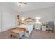Cozy bedroom with a queen-size bed, nightstands, a ceiling fan, and a neutral color scheme at 8 Hilltop Crest St, Henderson, NV 89011