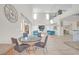 Breakfast nook with a round table and four gray chairs at 8 Hilltop Crest St, Henderson, NV 89011