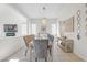 Elegant dining room with a chandelier and modern decor at 8 Hilltop Crest St, Henderson, NV 89011