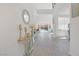 Bright foyer with modern finishes, open floor plan, and neutral color palette with views of the pool at 8 Hilltop Crest St, Henderson, NV 89011