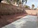 Landscaped backyard with a spacious patio area at 8353 Stillhouse Ct, Las Vegas, NV 89113