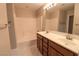 Bathroom boasts a double vanity and a separate tub at 8353 Stillhouse Ct, Las Vegas, NV 89113