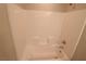 Bathroom with shower/tub combo and tiled surround at 8353 Stillhouse Ct, Las Vegas, NV 89113