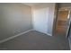 Bright bedroom with double-door closet and carpet at 8353 Stillhouse Ct, Las Vegas, NV 89113