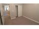 Well-lit bedroom with double-door closet and carpet at 8353 Stillhouse Ct, Las Vegas, NV 89113