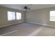 Spacious carpeted bedroom with neutral wall colors at 8353 Stillhouse Ct, Las Vegas, NV 89113