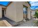 Front entrance of a home with a walkway and landscaping at 9016 Skye Canyon Ranch St, Las Vegas, NV 89166