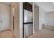 Foyer with pantry and stainless steel refrigerator at 9016 Skye Canyon Ranch St, Las Vegas, NV 89166