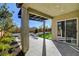 Covered patio with seating area and view of backyard at 9016 Skye Canyon Ranch St, Las Vegas, NV 89166