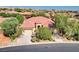 Single-story home with tile roof and two-car garage at 9092 National Park Dr, Las Vegas, NV 89178