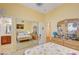 Bedroom with mirrored closet and floral bedding at 9092 National Park Dr, Las Vegas, NV 89178