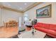 Living room with hardwood floors, seating area, and view of dining area at 9092 National Park Dr, Las Vegas, NV 89178