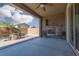 Relaxing covered patio with fireplace and seating area, perfect for outdoor entertaining at 1015 Solana Crest St, Henderson, NV 89052