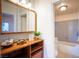 Bathroom with vanity and shower/tub combo at 107 Manganese St, Henderson, NV 89015
