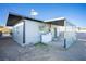 House exterior with covered patio and side yard at 107 Manganese St, Henderson, NV 89015