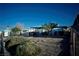 Front view of a single story house with a yard at 107 Manganese St, Henderson, NV 89015