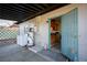 Covered patio laundry area with access to kitchen at 107 Manganese St, Henderson, NV 89015