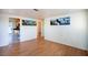 Living area with hardwood floors and kitchen view at 107 Manganese St, Henderson, NV 89015