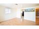 Living room with wood floors and large artwork at 107 Manganese St, Henderson, NV 89015