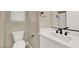 Clean bathroom with white vanity and modern fixtures at 11851 River Hawk Ave, Las Vegas, NV 89138