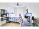 Spacious bedroom with desk, large TV, and comfortable bed at 1290 El Solindo Ln, Henderson, NV 89002