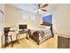 Bedroom with desk and a double bed, ceiling fan at 1290 El Solindo Ln, Henderson, NV 89002