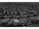 Aerial view of house and surrounding neighborhood at 1306 Big Tree Ave, North Las Vegas, NV 89031