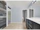 Modern bathroom with double vanity and access to a toilet and shower at 1306 Big Tree Ave, North Las Vegas, NV 89031