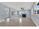 Bright living room featuring a fireplace and tile flooring at 1306 Big Tree Ave, North Las Vegas, NV 89031