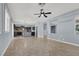 Open concept living room with views into the kitchen area at 1306 Big Tree Ave, North Las Vegas, NV 89031