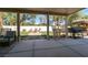 Covered patio with comfortable seating and backyard views at 1306 Big Tree Ave, North Las Vegas, NV 89031