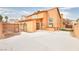 Large backyard with a patio, built-in grill, and a fence at 1411 Bareback Ct, Henderson, NV 89014