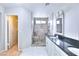 Spa-like bathroom with walk-in shower and double vanity at 1411 Bareback Ct, Henderson, NV 89014