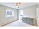 Cozy bedroom with ceiling fan and access to bathroom at 1411 Bareback Ct, Henderson, NV 89014