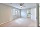 Spacious bedroom with bay window and ceiling fan at 1411 Bareback Ct, Henderson, NV 89014