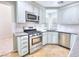Modern kitchen with stainless steel appliances at 1411 Bareback Ct, Henderson, NV 89014